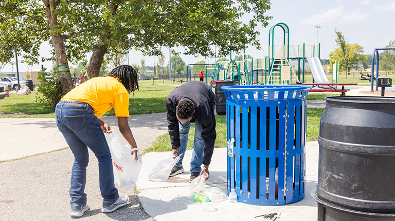 people picking up trash